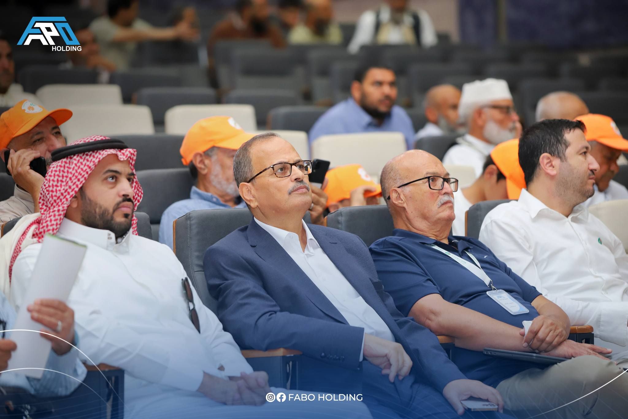 old men set chair in fapo holding event